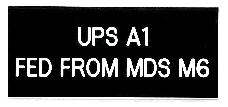 White on black lamacoid UPS identification label reading UPS A1 Fed From MDS M6