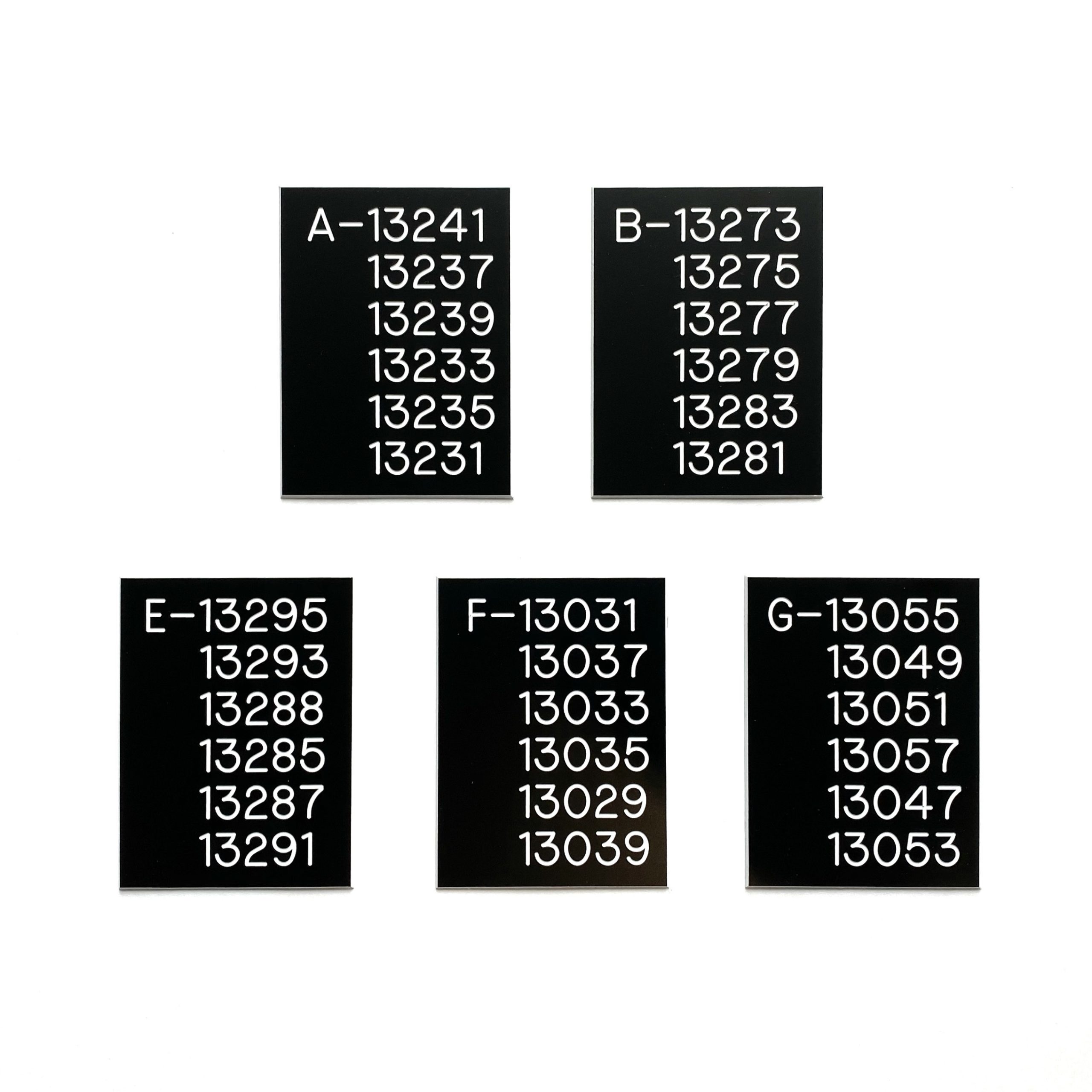 Engraved phenolic panel schedule circuit identification labels, multiple panels, white on black
