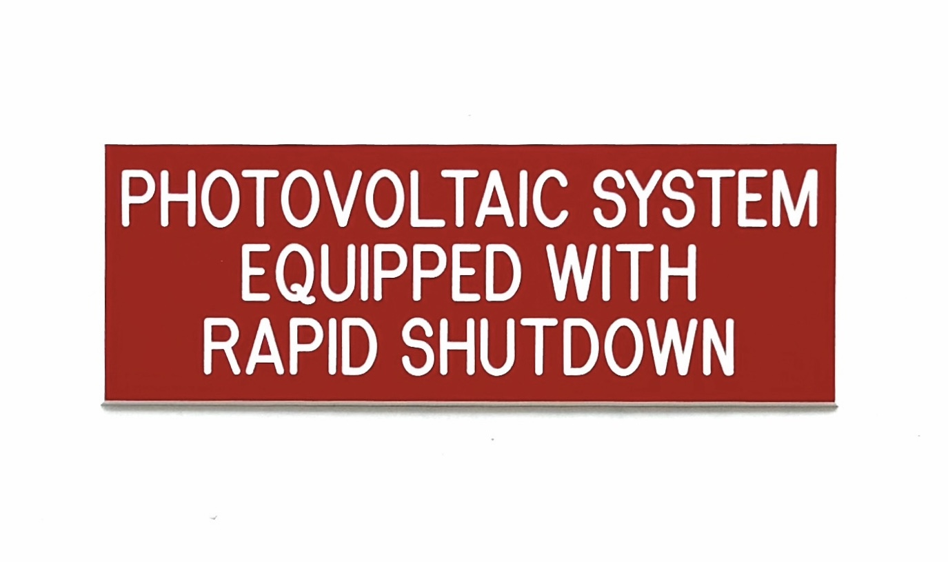 Photovoltaic system equipped with rapid shutdown — custom engraved red phenolic label for solar contractors